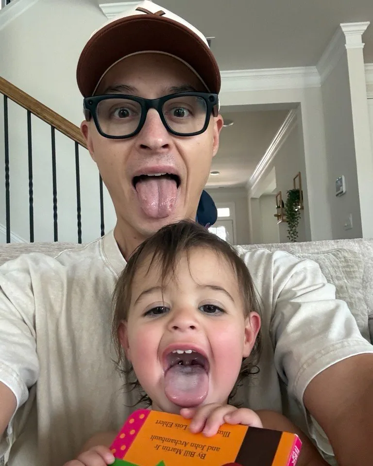Tyler and Lucia making playful faces for a selfie